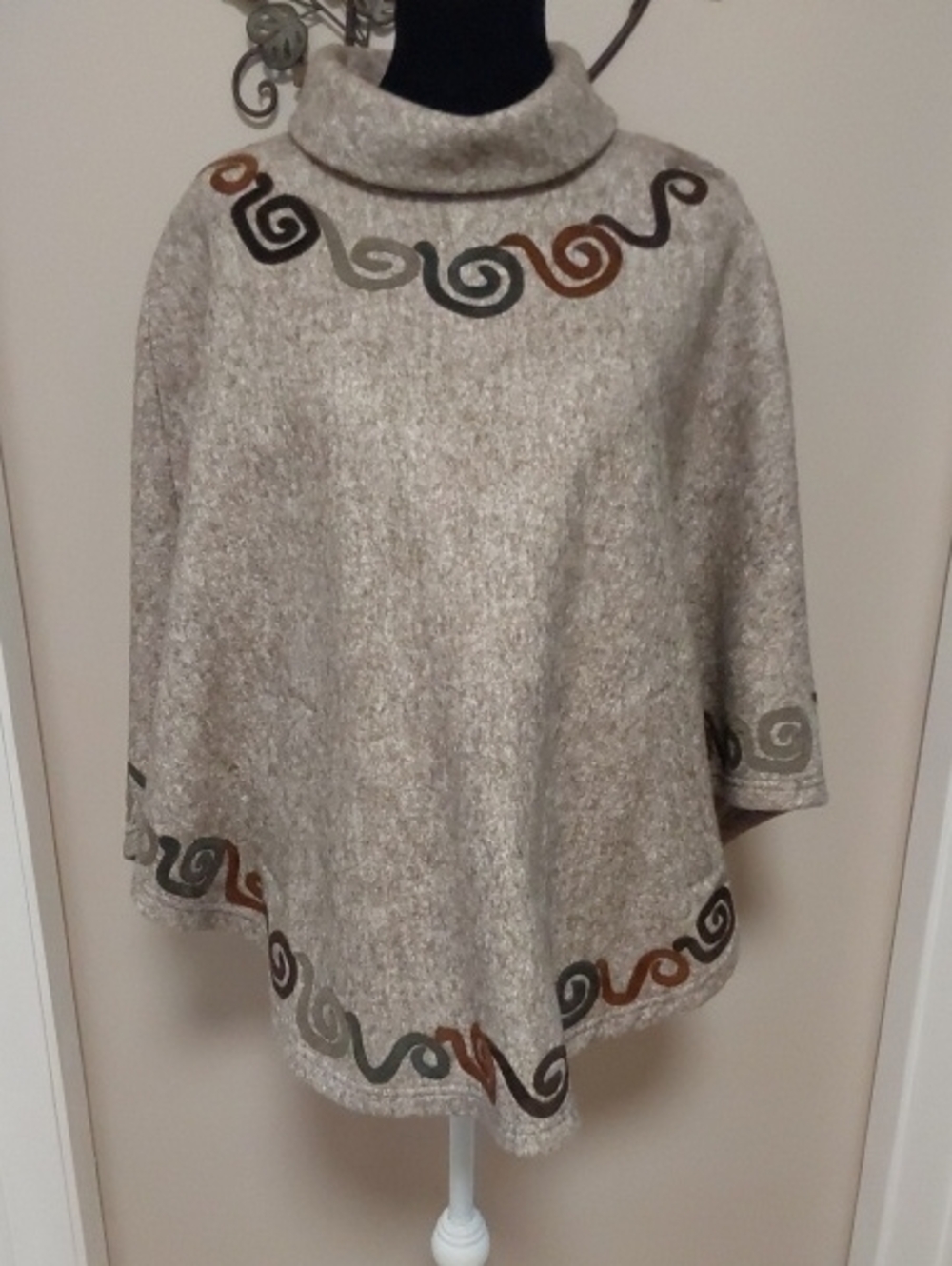 Hand Made Poncho with Decorative Swirl Trim